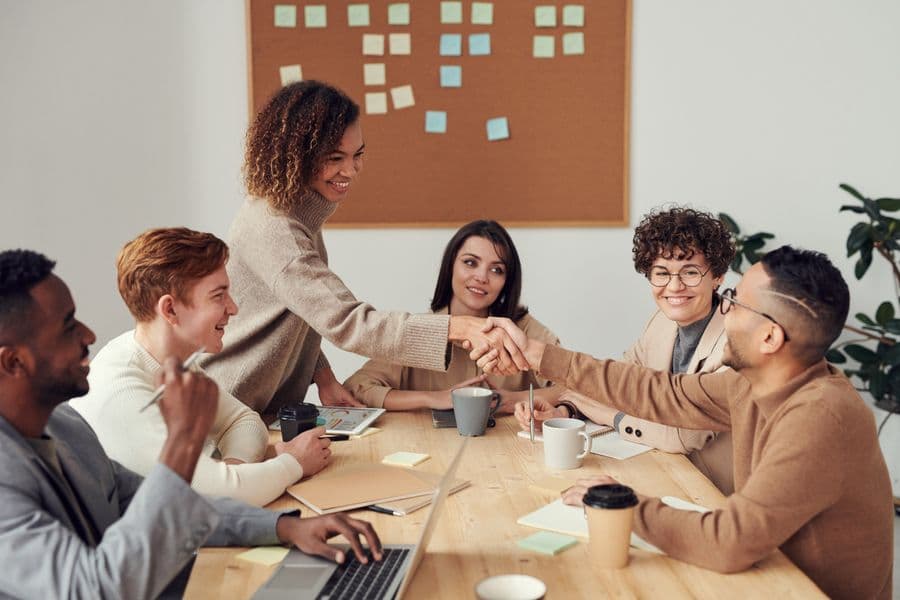 Team meeting and handshake